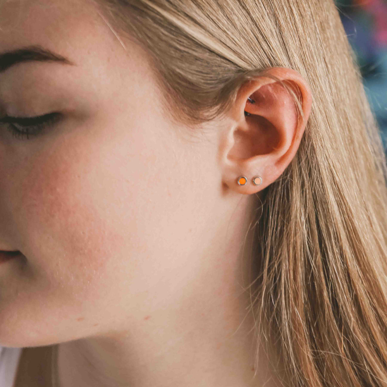 Neon coral enamel studs