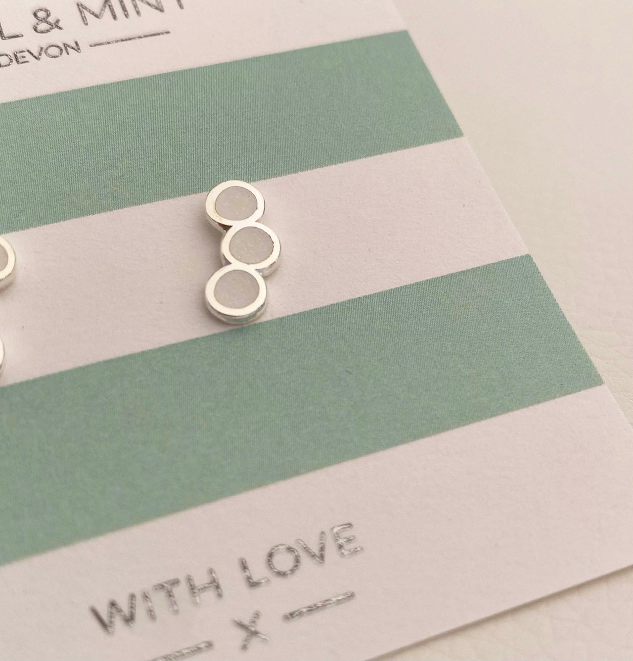 Tri circle studs with pearlescent sparkle