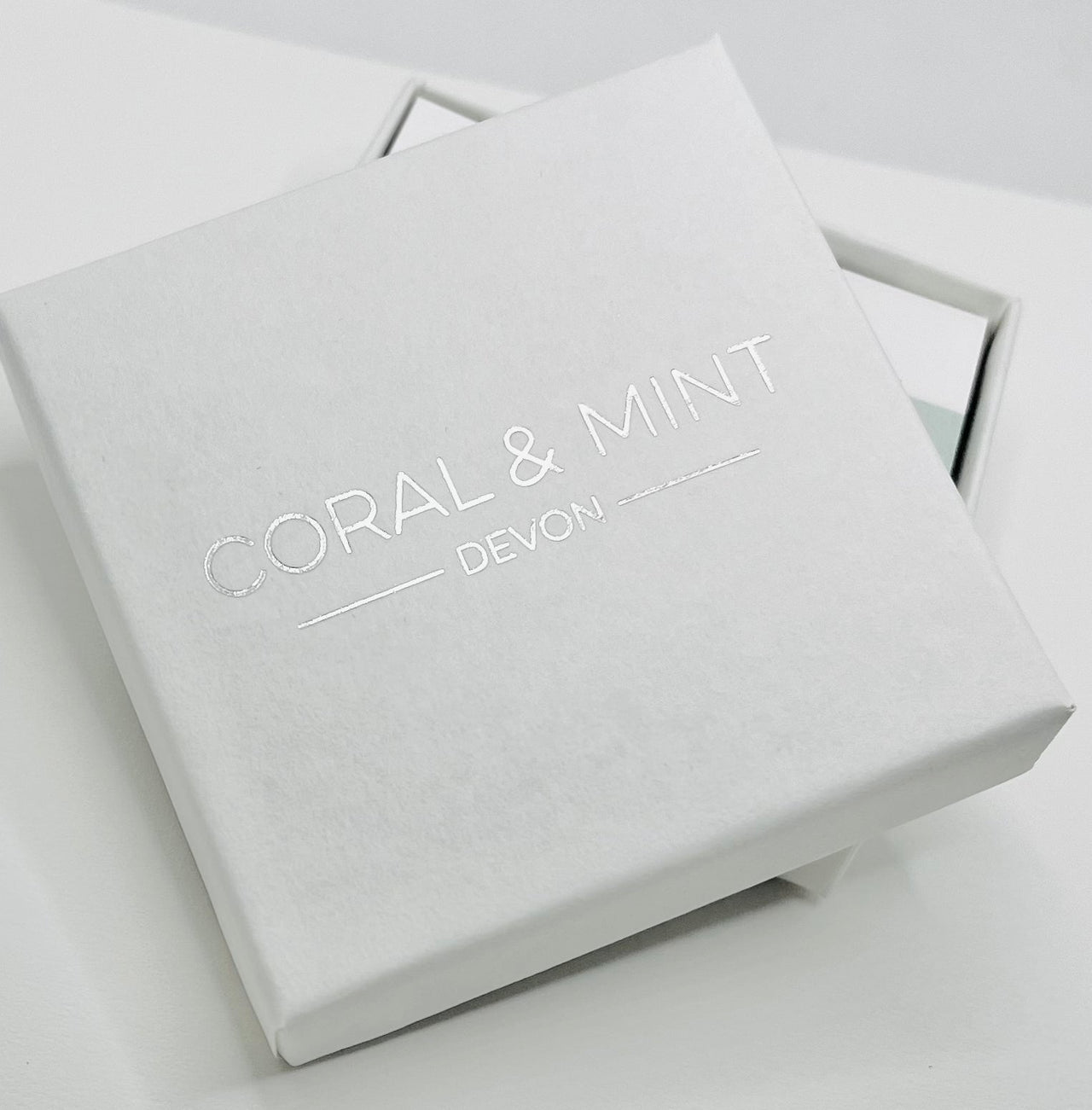 Bubble flower studs with mint enamel